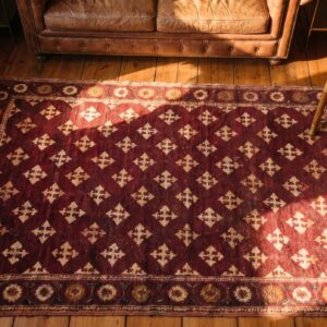 Antique 4 Pointed Star Indian Small Wool Agra Red Rug (SKU 21149) - styled overhead view