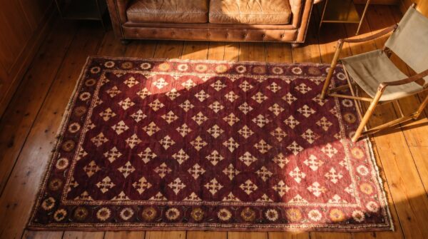 Antique 4 pointed star indian small wool agra red rug 2 Antique 4 pointed star indian small wool agra red rug (sku 21149) - styled overhead view