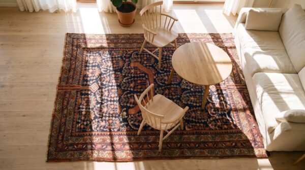 Antique afshar persian allover floral hand knotted square rug (sku 24508) - styled overhead view