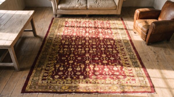 Allover design antique classic coral color indian agra rug (sku 21155) - styled overhead view