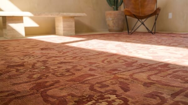 Antique allover floral wool hand knotted pile coral 1930s rug 8 Antique allover floral wool hand knotted pile coral 1930s rug (sku 22806) - in-room detail