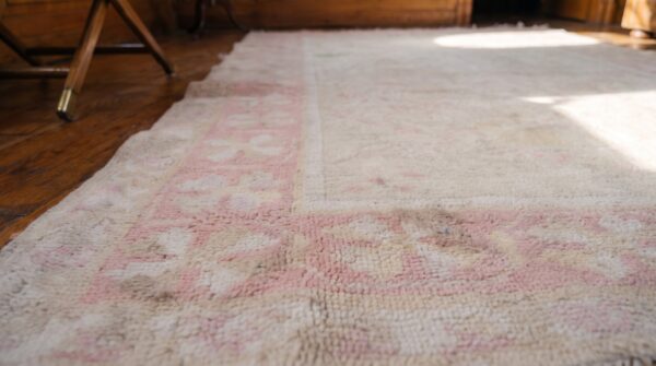 Antique allover floral hand knotted cotton pile ivory cream indian agra rug 7 Antique allover floral hand knotted cotton pile ivory cream indian agra rug (sku 21361) - in-room detail