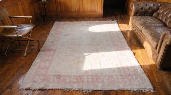 Antique allover floral hand knotted cotton pile ivory cream indian agra rug 2 Antique allover floral hand knotted cotton pile ivory cream indian agra rug (sku 21361) - styled overhead view