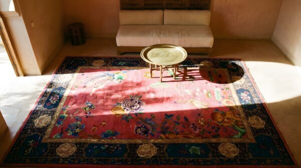 Antique allover floral design coral art deco chinese hand knotted rug (sku 24739) - styled overhead view
