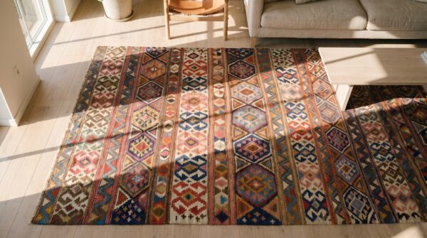 Antique allover geometric wool flat weave multicolor jewel tones 1920s rug 2 Antique allover geometric wool flat weave multicolor jewel tones 1920s rug (sku 18689) - styled overhead view