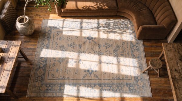 Antique allover geometric wool hand knotted pile ivory beige cream white 1920s rug (sku 21150) - styled overhead view