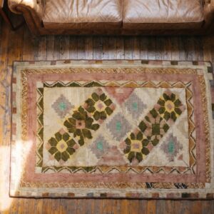 Antique American Folk Art Diamond In Square Pattern Hooked Rug (SKU 18413) - styled overhead view