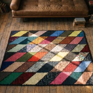 Antique American Hooked 1940s Multicolor Jewel Tones Square Wool Allover Geometric Rug (SKU 17663) - styled overhead view
