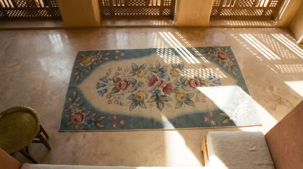 Antique american hooked canada ivory 1935 rug (sku 25379) - styled overhead view