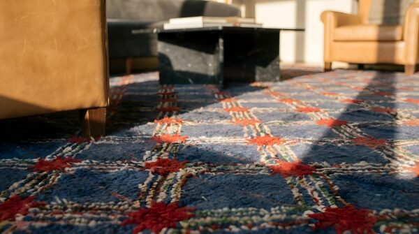 Antique american hooked room size wool blue folk art rug (sku 23807) - in-room detail