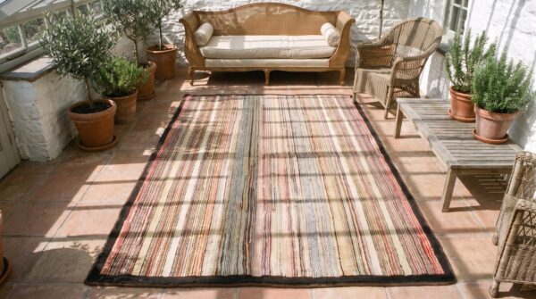 American antique multicolor hooked small scatter size wool 1890s rug 2 American antique multicolor hooked small scatter size wool 1890s rug (sku 20940) - styled overhead view