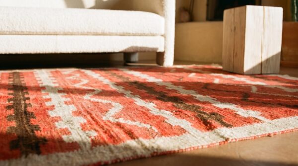 Antique american navajo rug 4'4"×7'2" bright red ground, ivory border, transitional period, circa 1890 16 Antique american navajo rug 4'4"×7'2" bright red ground, ivory border, transitional period, circa 1890 (sku 20941) - in-room detail