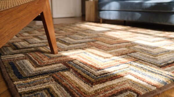 American small scatter size hooked wool 1890s antique rug 8 American small scatter size hooked wool 1890s antique rug (sku 20469) - in-room detail