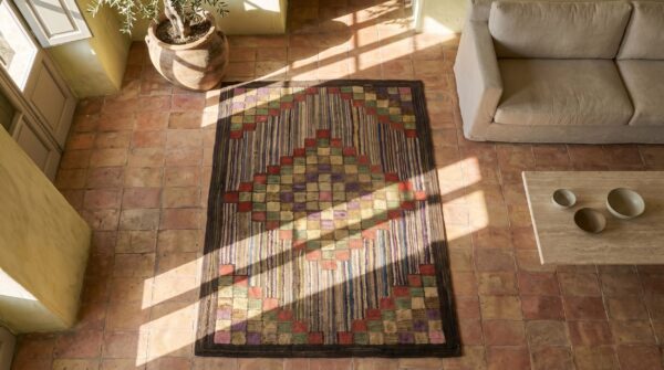 Antique american sunshine and shadow pattern folk art hooked rug 2 Antique american sunshine and shadow pattern folk art hooked rug (sku 18604) - styled overhead view