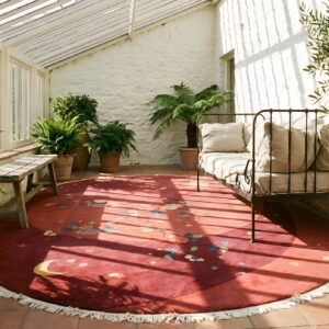 Antique Art Deco Chinese Oval Rug with Artistic Swirl Pattern in Red (SKU 24046) - styled overhead view