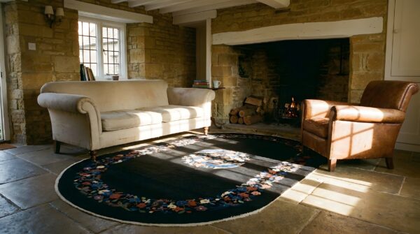 Antique art deco small oval wool black rug 7 Antique art deco small oval wool black rug (sku 24465) - room view