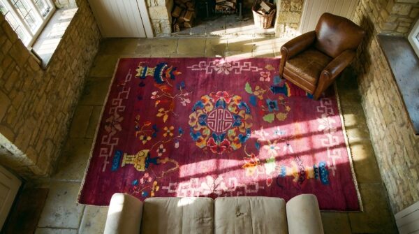 Antique art deco small scatter size purple wool rug (sku 24244) - styled overhead view