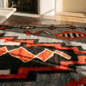 Artistic Bold Tribal Design Antique Native American Flatweave Navajo Rug (SKU 23798) - in-room detail