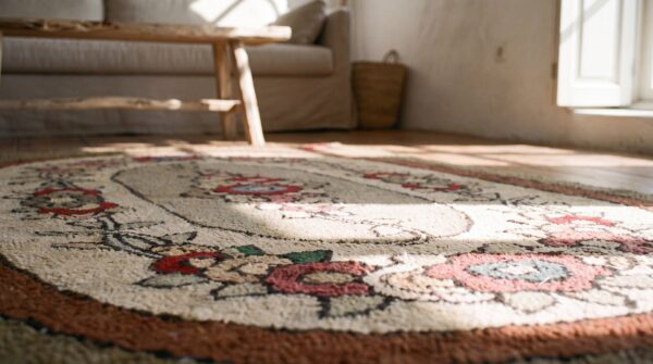 Artistic oval floral inlay design antique american hooked rug 8 Artistic oval floral inlay design antique american hooked rug (sku 17187) - in-room detail