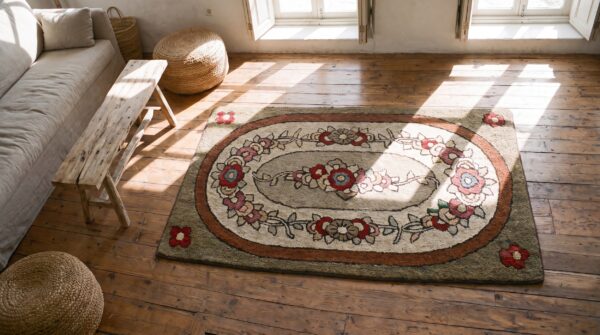 Artistic oval floral inlay design antique american hooked rug 2 Artistic oval floral inlay design antique american hooked rug (sku 17187) - styled overhead view