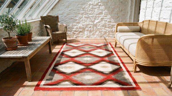 Artistic tribal pattern flatwoven antique native american navajo rug 6 Artistic tribal pattern flatwoven antique native american navajo rug (sku 20112) - room view
