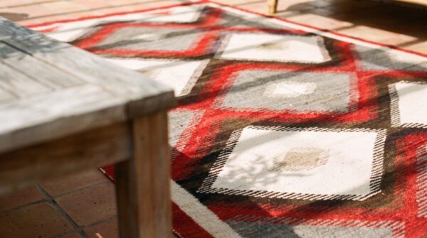 Artistic tribal pattern flatwoven antique native american navajo rug 7 Artistic tribal pattern flatwoven antique native american navajo rug (sku 20112) - in-room detail
