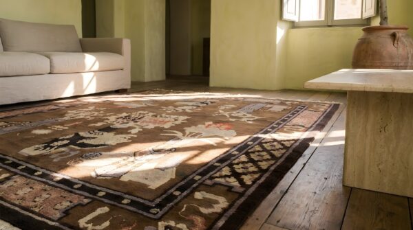Antique baotou small scatter size wool brown rug (sku 22927) - in-room detail