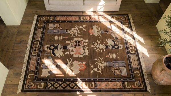 Antique baotou small scatter size wool brown rug (sku 22927) - styled overhead view