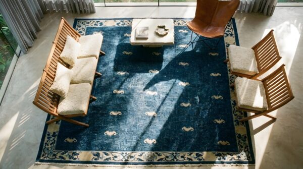 Blue antique 1880s allover geometric hand knotted pile wool rectangle rug 2 Blue antique 1880s allover geometric hand knotted pile wool rectangle rug (sku 23528) - styled overhead view