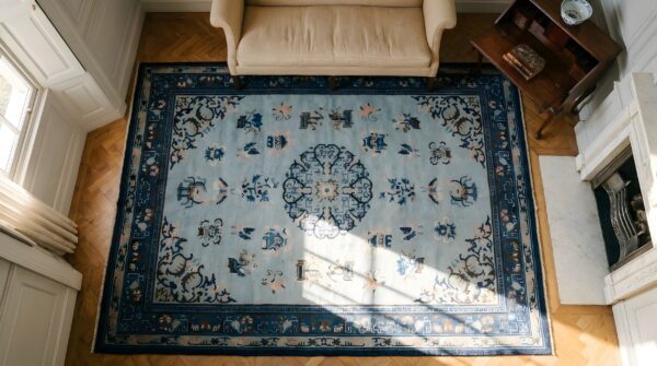 Hand knotted pile antique blue 1890s wool rectangle rug (sku 25175) - styled overhead view