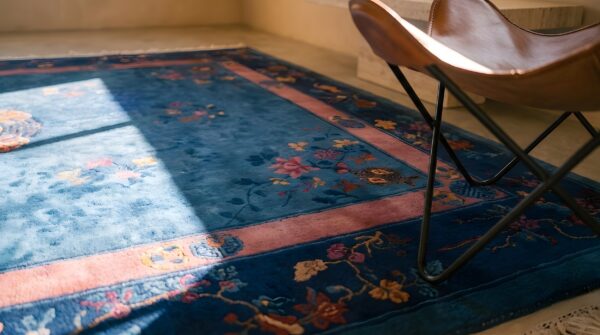 Wool hand knotted pile antique blue 1920s floral medallion rectangle rug (sku 22212) - in-room detail