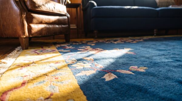 Wool blue hand knotted pile 1920s floral rectangle antique rug (sku 23455) - in-room detail