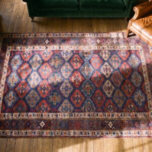 Blue Antique Allover Tribal Design Persian Kurdish Area Rug (SKU 18911) - styled overhead view