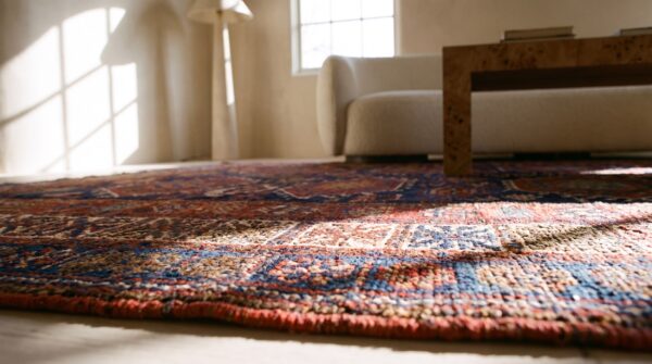 Blue background antique persian tribal geometric jewel ton color design kurdish rug 8 Blue background antique persian tribal geometric jewel ton color design kurdish rug (sku 21800) - in-room detail