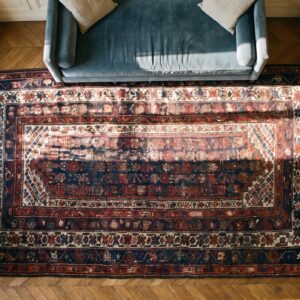 Antique Blue Background Persian Tribal Kurdish Small Size Rug (SKU 20351) - styled overhead view