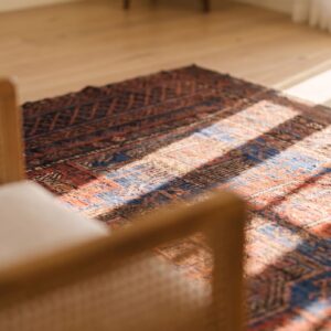 Blue Bold Tribal Design Antique Wool Pile Persian Baluch Rug (SKU 24181) - in-room detail