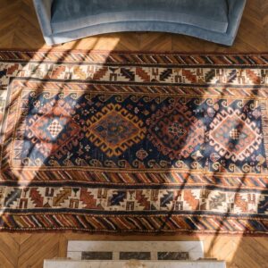 Hand Knotted Wool Pile Antique Blue Color Allover Tribal Geometric Caucasian Rug (SKU 19577) - styled overhead view