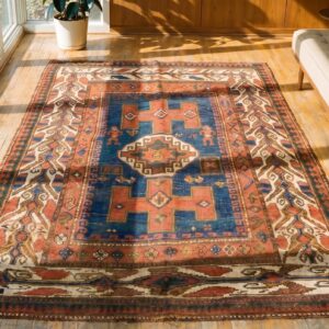Blue Ground Tribal Geometric Figural Pattern Antique Caucasian Kazak Rug (SKU 18639) - styled overhead view