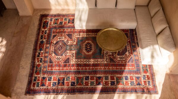Blue , ivory beige cream white , red late 19th century tribal geometric antique key hole design caucasian kazak rug - blue, ivory beige cream white, red 2 Blue , ivory beige cream white , red late 19th century tribal geometric antique key hole design caucasian kazak rug - blue, ivory beige cream white, red (sku 24513) - styled overhead view