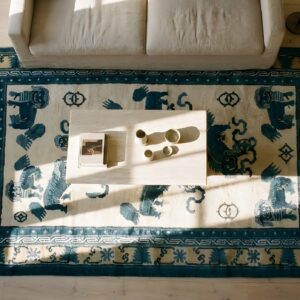 Antique Blue and Ivory Chinese Ningxia Small Foo Dog Rug (SKU 25165) - styled overhead view