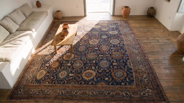 Blue antique large scale tribal design room size persian bidjar rug 2 Blue antique large scale tribal design room size persian bidjar rug (sku 20157) - styled overhead view