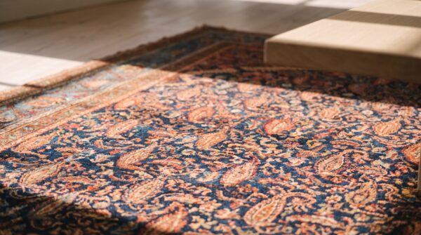 Antique blue paisley pattern square persian malayer rug (sku 24857) - in-room detail