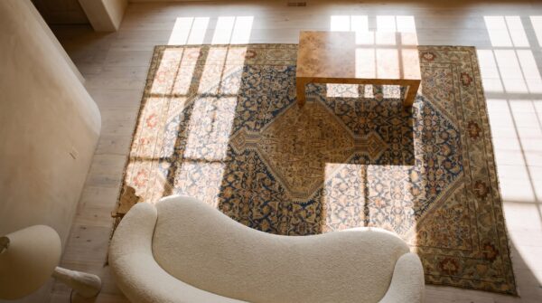 Blue rectangle 1900s wool hand knotted pile antique floral medallion rug 2 Blue rectangle 1900s wool hand knotted pile antique floral medallion rug (sku 23341) - styled overhead view