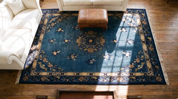 Wool hand knotted pile blue rectangle 1920s antique rug (sku 24827) - styled overhead view