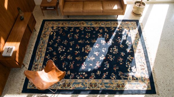 Hand knotted pile blue rectangle antique 1920s wool rug 2 Hand knotted pile blue rectangle antique 1920s wool rug (sku 25041) - styled overhead view