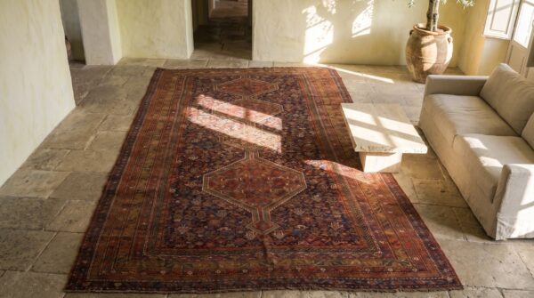 Blue tribal design antique persian khamse long and narrow gallery size rug 2 Blue tribal design antique persian khamse long and narrow gallery size rug (sku 18202) - styled overhead view