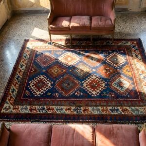 Blue Tribal Geometric Allover Design Antique Caucasian Kazak Rug (SKU 23929) - styled overhead view
