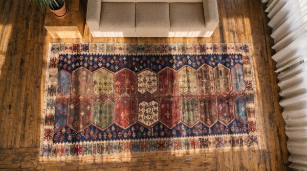 Blue antique tribal geometric mid 19th century turkish kilim long and narrow size flatweave rug 2 Blue antique tribal geometric mid 19th century turkish kilim long and narrow size flatweave rug (sku 19413) - styled overhead view