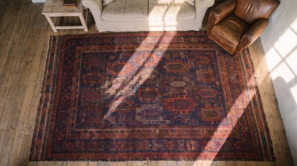 Blue tribal antique late 19th century afghan baluch rug 2 Blue tribal antique late 19th century afghan baluch rug (sku 22383) - styled overhead view