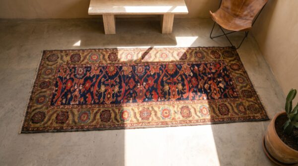 Blue tribal mid 19th century antique northwest persian hallway runner rug 2 Blue tribal mid 19th century antique northwest persian hallway runner rug (sku 19090) - styled overhead view
